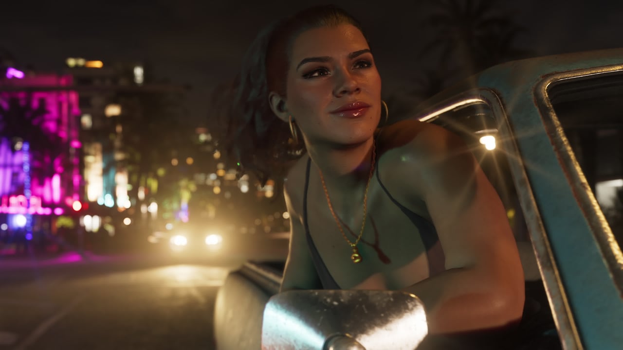 Lucia leans from a car during a neon-lit Vice City night